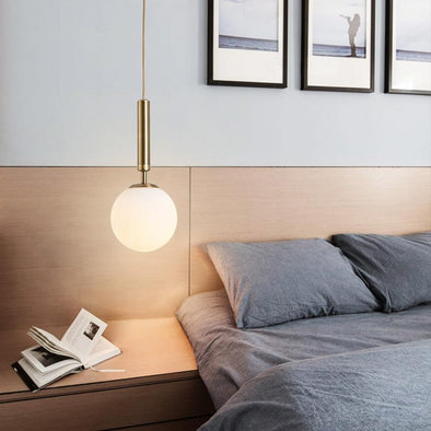 White & Gold Globe Pendant Light in Bedroom