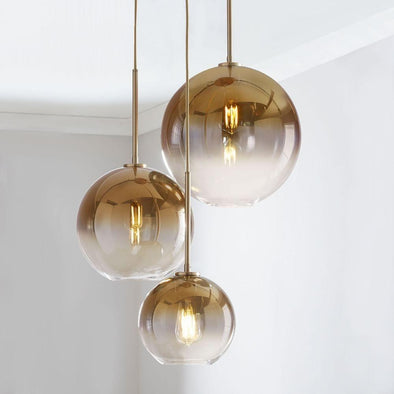 Set of Three Gold Glass Globe Pendant Light