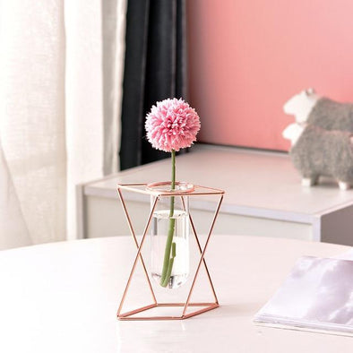 Small Rose Gold Geometric Terrarium Vase Dressed With a Pink Blossom 