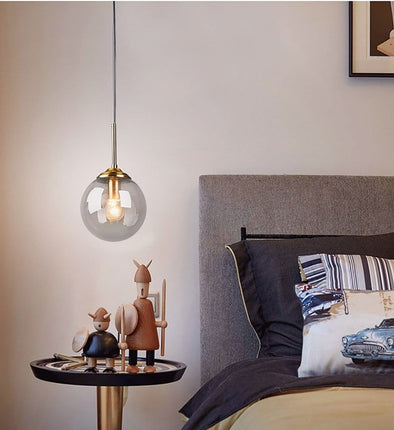 Amber Glass Pendant Lighting in Bedroom Setting